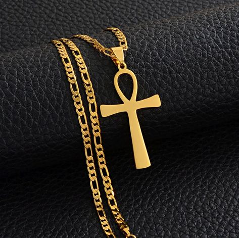 Each pendant comes with the chain in the picture(s) Pendant Metal: Stainless Steel + 18K gold plated Size: In pictures Chain Type: 3mm Figaro Chain Chain length available: 45 cm / 17.7 inches  50 cm / 19.6 inches 60 cm / 23.6 inches Want a different type of chains? we have 6 different type of chains available at the link. Sold separately. https://etsy.me/3y7vNnY  This is a fashion jewelry. It is not Pure gold or silver. Ancient Egypt Jewelry, Egyptian Cross, Egypt Jewelry, Africa Necklace, Egyptian Ankh, Egyptian Necklace, Ankh Necklace, Ankh Cross, Symbol Necklace