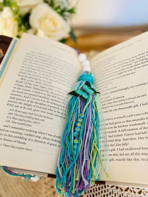 Tassel Bookmarks are the perfect addition to your reading time, it just makes it even more special! Great gift for yourself or to give.. why not romanticize the little things in life? Aesthetically pleasing appearance flowing outside the pages of any book or Bible. Also, doubles as a uniquely beautiful rear view mirror hanging tassel. How To Make A Bible Tassel, Diy Bible Tassels, Tassels For Bookmarks, Bible Tassel Bookmark, Bookmark With Tassel, Bible Bookmark, Tassel Bookmark, New Farm, Reading Time