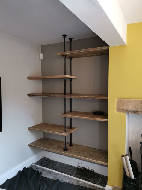 Bespoke shelving made using scaffold boards and 3/4inch pipe and fittings. Scaffold Shelves Living Room, Scaffolding Board Shelves, Scaffold Board Shelves Living Rooms, Industrial Shelves Living Room, Scaffolding Boards Ideas, Industrial Shelving Living Room, Scaffold Board Furniture, Scaffold Board Ideas, Scaffolding Shelves