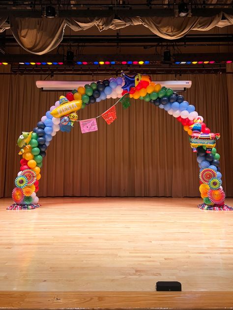 A large stage arch with 6 colors, and foil balloons Hispanic Heritage Balloon Arch, Hispanic Heritage Month Decorations, Hispanic Flags, Balloon Twisting, Balloon Delivery, Hispanic Heritage Month, Balloon Backdrop, Balloon Decor, Hispanic Heritage