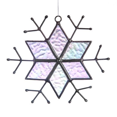 PRICES MAY VARY. Bring sparkling color inside during cold winter days with this festive stained glass snowflake Create a stunning window display by grouping several snowflakes together. Each snowflake sun catcher comes with a nylon string to suspend it from the suction cup that has been included. This handcrafted stained glass sun catcher has been made with lead free solder to protect you and the environment. This is a J Devlin original and exclusive design...enjoy! Bring sparkling color inside Christmas Tree Window, Stained Glass Ornaments, Crystal Snowflakes, Stained Glass Suncatchers, Stained Glass Window Hanging, Ornament Christmas Tree, Stained Glass Christmas, Snowflake Decorations, Glass Stars