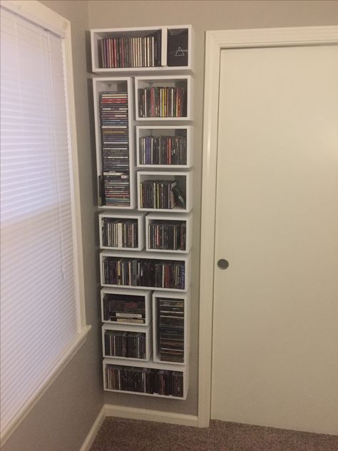 Custom box shelf CDs/DVDs Dvd Display Ideas Diy, Creative Dvd Storage Ideas, Shelves For Dvds, Dvd Storage Aesthetic, Movie Shelf Ideas Dvd Storage, Ways To Display Cds, Dvd Shelf Ideas, Cd Shelf Aesthetic, Movie Shelf Ideas