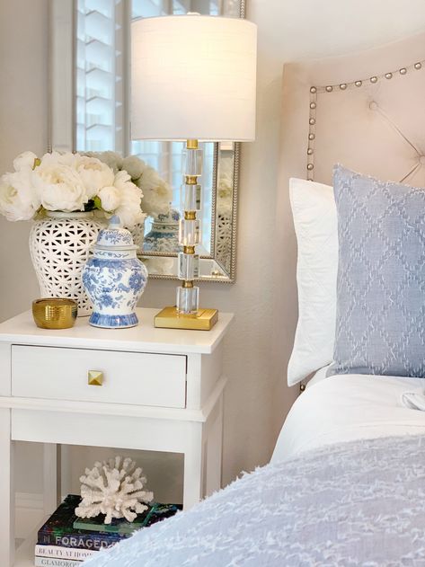 White Coastal Nightstand, Glam Coastal Decor, Costal Chic Bedrooms, Coastal Grandmillenial Bedroom, French Coastal Bedroom, Coastal Glam Bedroom, Nightstands Decor, Coastal Grandmother Bedroom, Blue And White Bedrooms