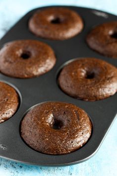 Baked Chocolate Donuts - I added mini chocolate chips & used 1/4 C sucanat, next time I won't any sugar & will use oil instead of melted butter.  I used almond milk instead of buttermilk also.  Bake at 350 This makes 6 donuts, don't know how it serves 8. Chocolate Donut Frosting, Cake Donuts Baked, Chocolate Donuts Baked, Doughnut Recipe Easy, Base Cake, Cake Donuts Recipe, Easy Donut Recipe, Donuts Donuts, Homemade Donuts Recipe