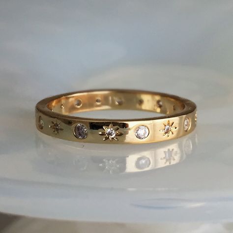 Our mesmerizing Celestial ring is set upon a smooth gold band. Equally gorgeous worn solo as it is stacked alongside your favorite rings. Cubic Zirconia Crystals Engraved Stars and Moons Gold Plating Moonlight Art, Stars And Moons, The Moon And Stars, Celestial Ring, Jewelry Lookbook, The Dark Side, Moon And Stars, Fantasy Jewelry, Girly Jewelry