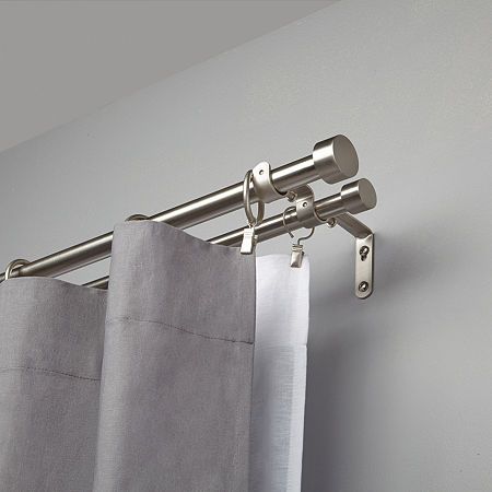 Unlike cheaply made rods that tend to bend or warp over time, each Cappa curtain rod from Umbra is made of high-quality metal and individually checked for quality assurance. Your Cappa Double Curtain Rod Set conveniently adjusts and gives you the flexibility to accommodate 1 or 2 curtain panel configurations depending on your needs. Plus, everything you need to get it set up fast comes in the box including the 2 telescoping rods, metal finials, complete mounting hardware with cast metal brackets Door Curtain Pole, Double Curtain Rod Brackets, Double Curtain Rod Set, Curtain Rod Brackets, Double Rod Curtains, Plain Curtains, Double Curtains, Tier Curtains, Curtain Pole