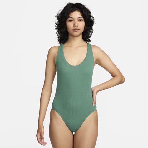 Elevate your swimwear game with a textured swimsuit. The light bust support is best for casual swimming and catching rays. A medium coverage bottom cut pairs perfectly with wide straps that help provide an open-back look and are designed to lay flat. Textured Swimsuit, Aquarius Blue, Swimming Swimsuit, Nike Swim, Green Swimsuit, Water Activities, Wide Straps, Lay Flat, Womens Swim