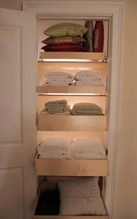 For linen closets, slide-out drawers are a great way to keep contents organized. You can buy drawers on sliders at most home improvement stores – think kitchen drawers that have the same concept. Then just add towels, blankets or whatever you plan to store there to the drawers and instead of having to rummage through them to find what you need, you can simply pull out the drawer for a clear look. Diy Kast, Linen Closets, Closet Organizer With Drawers, Mini Loft, Closet Drawers, Real Estat, Pull Out Drawers, Drawer Organizers, Linen Closet