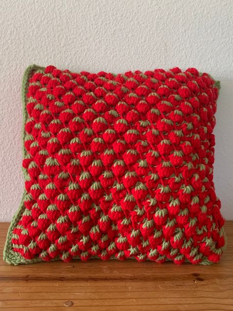 Strawberry field inspired pillow perfect for summer :) Hand crocheted. Pattern appears on front only with solid color on back. Can customize just message for details :) Two Color Crochet Projects, Crochet Fruit Pillow, Throw Pillow Crochet Pattern, Crochet Strawberry Blanket, Strawberry Crochet Blanket, Strawberry Pillow Crochet, Crochet Strawberry Pillow, Crochet Pillow Ideas, Crochet Throw Pillows