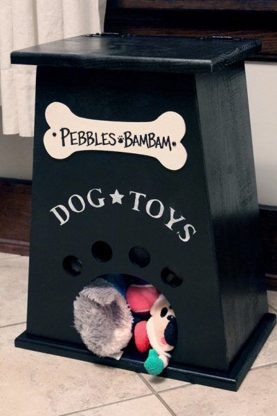 dog toy box by collegeviewcrafts Toybox Ideas, Box Beds, Spoiled Dog, Dog Toy Box, Diy Toy Storage, Dog Toy Storage, Dog Tricks, Puppy Beds, Simple Toys