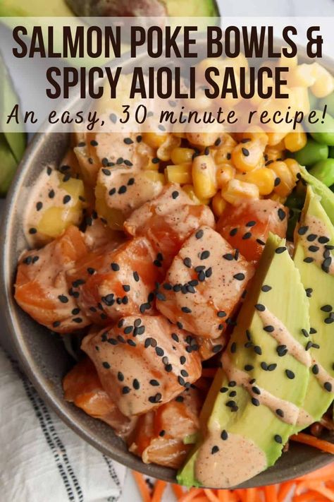 This salmon poke bowls recipe is quick, easy & incredibly tasty. Poke sauce recipe included in post! Packed with protein, veggies & flavor, poke bowls make an exciting, healthy lunch or dinner you'll really look forward to! Rice & mixed greens topped with sushi-grade teriyaki salmon, shredded carrots, edamame, corn, mango, avocado & black sesame seeds all drizzled with spicy aioli poke sauce dressing, yum! #pokebowlrecipe #pokesaucerecipe #salmonpokebowl #30minutemeals #easyseafood Salmon Poke Bowl Sauce, Poke Sauce Recipes, Poke Bowls Recipe, Poke Bowl Sauce, Salmon Poke Bowl Recipe, Poke Recipe, Protein Veggies, Poke Bowl Recipe, Salmon Poke