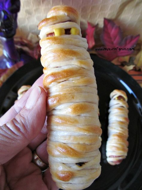 Mummy Hot Dogs made with store bought Pizza Dough!   http://www.myturnforus.com/2015/10/mummy-hot-dogs_5.html Halloween Hot Dogs, Treats For A Party, Raw Apple Cake, Party Sandwiches Recipes, Hot Dog Crescent Rolls, Apple Bundt Cake Recipes, Mummy Hot Dogs, Store Bought Pizza Dough, Hot Dog Rolls