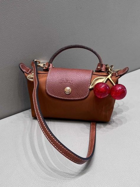 This cherry pendant is good -looking with my longchamp mini bag.Of course you can hang it on the key Mini Longchamp Bag, Longchamp Pouch, Longchamp Mini Bag, Charms For Bags, Cherry Pendant, Cherry Bag, Longchamp Mini, Uni Bag, Pretty Tote Bags