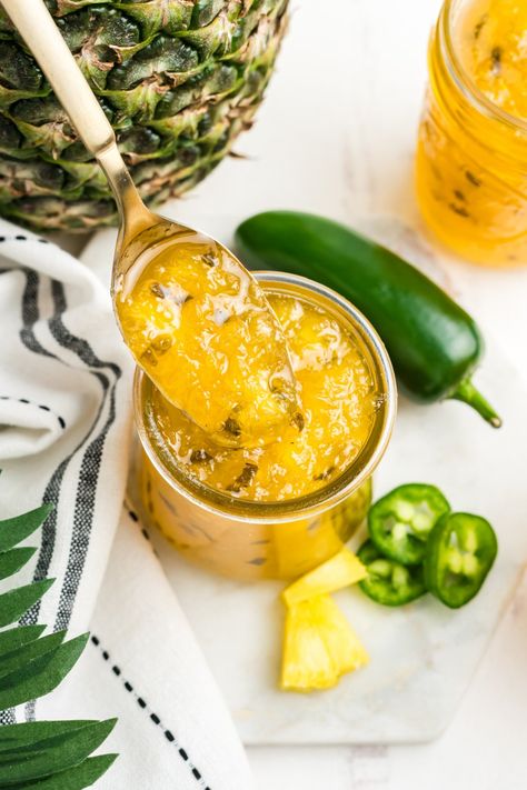 A jar of pineapple jalapeno jam with a spoon holding some jam up over the jar. via @2kitchendivas Mango Jalapeno Jam, Pineapple Jalapeno Jam, Mango Jalapeno Salsa, Peach Jalapeno Jam, Jalapeno Jelly Recipes, Pineapple Jelly, Jalapeno Jam, Jalapeno Jelly, Mango Jam