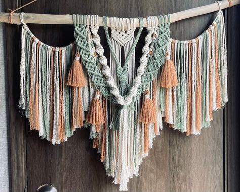 "This large, boho inspire, earth tone macrame piece will be the perfect addition to any wall in your home. Add this beautifully detailed piece to your bedroom or living area to give some extra texture and interest to your walls. Feel free to reach out for custom sizing and colors.  Dimensions Height: roughly 27\" Width: 22\", 27\" Length is measured from top of the hanging cord to the bottom of the fringe.  Materials Wooden stick, 3mm & 5mm cotton cord" Large Colorful Macrame Wall Hanging, Ombre Macrame Wall Hanging, Macrame Two Colors, 5mm Macrame Projects, Macrame With Yarn, Boho Yarn Wall Art, Macrame Aesthetic, Uni Room Ideas, Extra Large Macrame Wall Hanging