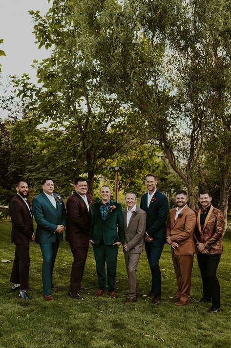 Mismatched Jewel Toned Groomsmen Suits #groomsmen #groomsmensuits #mensfashion #menstyle #retrowedding #70swedding #weddingideas #retrofashion #menssuits #mensuits #groom #groomsmenpose #groomsenphoto #fallgroom #fallweddingaesthetic #fallwedding #outdoorwedding #weddingparty #weddingdesign #fallweddinginspo #fallweddingideas #emeraldgreen #weddingcolors #fallweddingcolors #jewelcolors #fallcolors #fallcolorpalette #fallweddinginspo #groomsmenphotos Groomsmen In Different Colors, Groomsmen Velvet Jacket, Mixed Color Groomsmen Suits, Autumnal Groomsmen, Boho Mens Wedding Attire Mismatched Groomsmen, Autumn Groomsmen Suits, Groomsmen Multicolor, Cottagecore Groomsmen, Groomsmen Jewel Tone