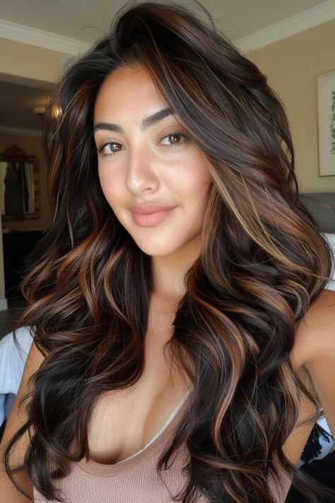 Smiling woman with long, wavy hair featuring caramel highlights, indoors. Highlights Color Ideas, Caramel Highlights On Dark Brown, Chocolate Hair With Caramel Highlights, Caramel Highlights Hair, Golden Caramel Highlights, Highlights Hair Color Ideas, Espresso Hair, Caramel Hair Highlights, Highlights Hair Color