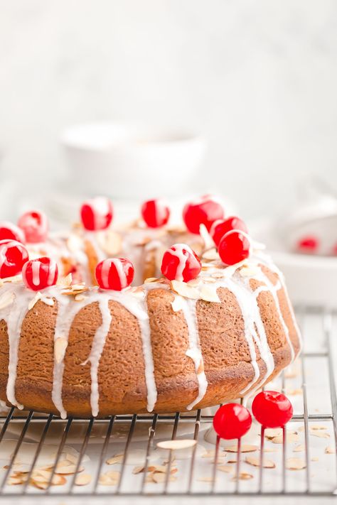 Easy Cherry Almond Bundt Cake - Made with yellow cake mix, instant vanilla pudding mix, almond extract, a jar of maraschino cherries, and sliced almonds, this easy bundt cake recipe is full of irresistible cherry almond flavor and effortlessly soft and tender. Cherry Almond Bundt Cake, Cherry Bundt Cake, Almond Bundt Cake, Cherry Chip Cake Mix, Cherry Chip Cake, Cherry Cake Recipe, Easy Bundt Cake Recipes, Recipes Using Cake Mix, Easy Bundt Cake