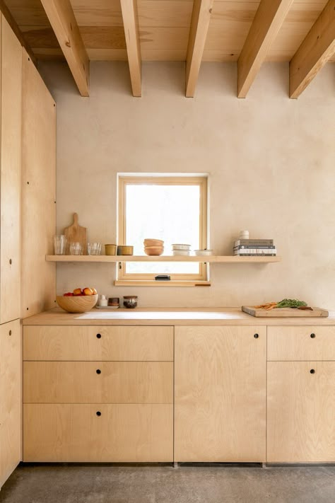 birch plywood cabinets paired with concrete floors. Different stain? Storage Room, Cabinet Storage Type, and Shelves Storage Type Streamlined birch plywood cabinetry and a maple butcher-block counter forms the kitchenette, which isn’t intended for extensive meal prep. The building is a blend of "a bedroom and camping," says Shaw, which means much of the cooking and cleaning happens outside. Cor Ten Steel, Birch Cabinets, Plywood Kitchen, Plywood Interior, Plywood Cabinets, Casa Patio, Plywood Furniture, Küchen Design, 인테리어 디자인