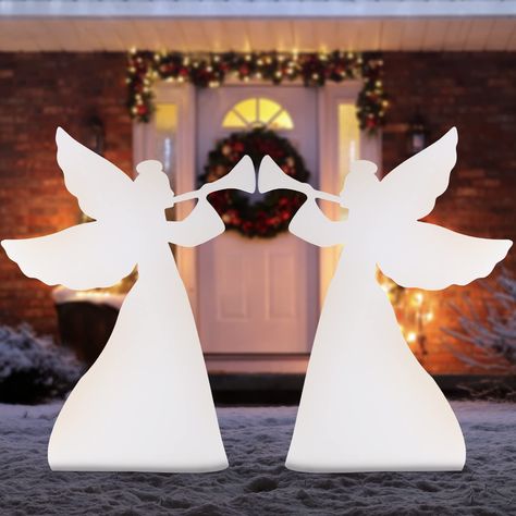 PRICES MAY VARY. 2-PIECE SET: Two angels with matching wings and trumpets stand 36 inches tall to add grace and style to any holiday display A CHRISTMAS CLASSIC: The silhouettes serve as a charming centerpiece and a tasteful accessory to your nativity scene, all in one package! QUICK ASSEMBLY: A simple, 3-step, one-time assembly process makes this set a convenient addition to your outdoor decor; includes four L-shaped ground stakes with two sizes for optimal support DURABLE DESIGN: Reliable, wat Trumpet Accessories, Outdoor Nativity Scene, Holiday Yard Decor, Christmas Angel Decorations, Outdoor Nativity, Two Angels, Christmas Yard Decorations, Yard Decorations, Christmas Classic