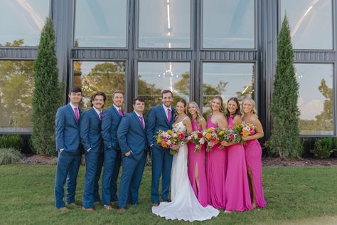 Pink Bridesmaid Blue Groomsmen, Fuscia Bridesmaid Dresses, Bright Pink And Blue Wedding Flowers, Blue Suit Wedding Party, Wedding Blue Color Schemes, Wedding Pink And Blue, Pink Bridal Party, Pink And Blue Wedding, Bright Pink Wedding