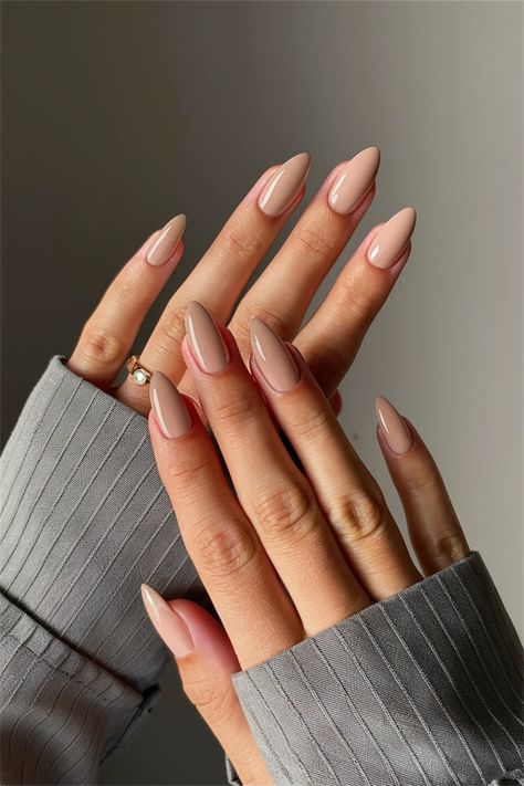 Discover the elegance of simplicity with these simple nail ideas that celebrate neutral plain colors. A soft beige base with a delicate matte finish brings a subtle sophistication to your manicure, perfect for any occasion. Enhance the look with a touch of minimalist nail art, like a tiny gold dot on each accent nail. This chic style is not only trendy but also incredibly easy to DIY at home! Grab your tools and start creating! #SimpleNailIdeas #NeutralNails #ChicManicure Soft Colors Nails Design, Simple But Chic Nails, Long Nail Shapes Acrylic, Beige Bridal Nails, Neutral Bridal Nails Wedding, Neutral Fall Wedding Nails, Nails For Blonde Hair, Clean Nude Nails, Classy Nails Neutral