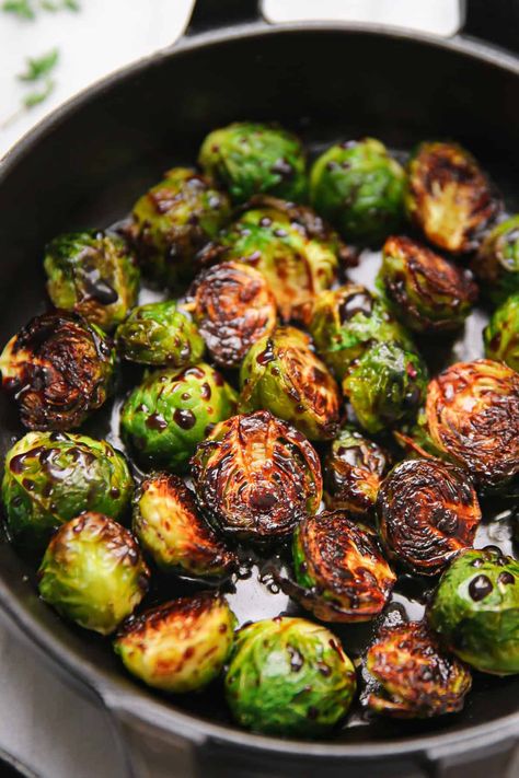 Roasted Brussels Sprouts with Balsamic Glaze in a cast-iron pan What To Use Balsamic Glaze On, Brussel Sprout Balsamic Glaze, Cast Iron Brussel Sprouts, Brussels Sprouts Recipe Balsamic, Pan Brussel Sprouts, Brussel Sprouts With Balsamic Glaze, Balsamic Glazed Brussel Sprouts, Roasted Brussel Sprouts With Balsamic, Honey Balsamic Brussel Sprouts