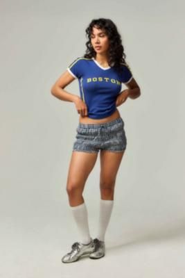 Rep Boston in this off-duty football tee. Cut from a cotton jersey complete with a V-neckline, cap sleeves, a slim-fit and a cropped hem. Finished with sporty detailing including stripes and contrast trims. **Content + Care** \- 100% Cotton \- Machine wash **Size + Fit** \- Model wears a size Small | Urban Outfitters UO Mia Boston Baby T-Shirt Top - Navy XL Crop Jersey Outfit, Womens Football Jersey, Football Tops, Football Tee, Jersey Outfit, Football Tees, Sports Fashion, Line Shopping, Baby T Shirt