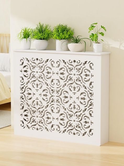 PRICES MAY VARY. Design and Aesthetics: Our radiator covers for home are meticulously crafted with a stylish white hue, ensuring they blend seamlessly with any interior decor. The intricately designed hollowed pattern adds a touch of gracefulness and sophistication to the look, making these heater covers for home a perfect blend of functionality and fashion. Material and Durability: Made from high-quality PVC material, our radiator covers are designed to be robust and long-lasting. The material Steam Radiators, White Radiator Covers, Decorative Radiators, Heater Cover, Furniture Storage Cabinets, Air Vent Covers, White Storage, Room Additions, Radiator Cover