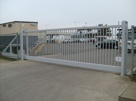 #Cantilever_Gates One of the main #advantages of using a cantilever gate system is that it is easy to automate. The easy automation of this style of gate is due to the fact that no part of the gate actually comes in touch with the ground. They are also very easy to install and to level perfectly. http://www.vishwasautomation.com/cantilever-gates/ Cantilever Gate, Gates Ideas, Home Gate Design, Steel Gate Design, Entrance Gates Design, Driveway Gates, Steel Gate, Sliding Gate, Gate House