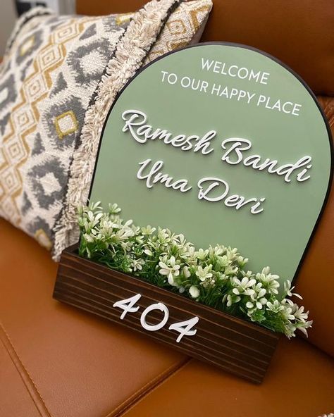 Make a statement from the moment you step foot at your entrance! 🌿Thanks to our customers for sharing these delightful setups🤍 Home Decor, Name Plate, Name Sign, Indian home, Entrance Decor, Housewarming, New Home Nameplates Design Ideas For Home Indian, Indian Home Entrance Decor, Home Name Plates Ideas Entrance, Entrance Name Plate Design, Name Board For Home, Indian Home Entrance, Name Plate For Home, Wooden Name Plates, Name Plates For Home