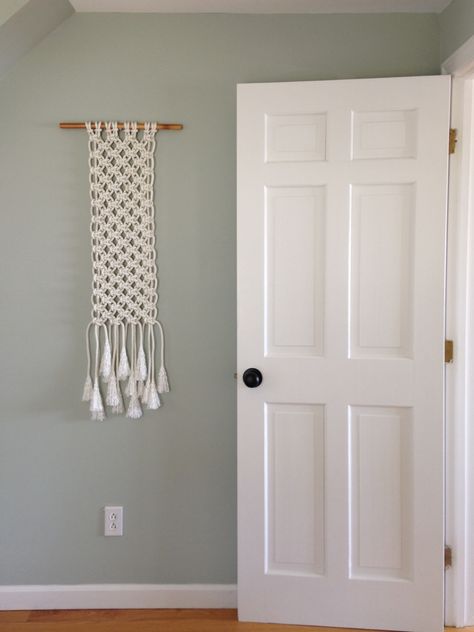 Benjamin Moore Gray Wisp. White macrame wall hanging. Bm Gray Wisp Paint, Gray Wisp Benjamin Moore Master Bedrooms, Gray Chasmere Benjamin Moore, Benjamin Moore Grey Wisp, Grey Wisp Benjamin Moore, Gray Wisp Benjamin Moore, Bm Gray Wisp, Benjamin Moore Gray Wisp, Apartment Door Entrance