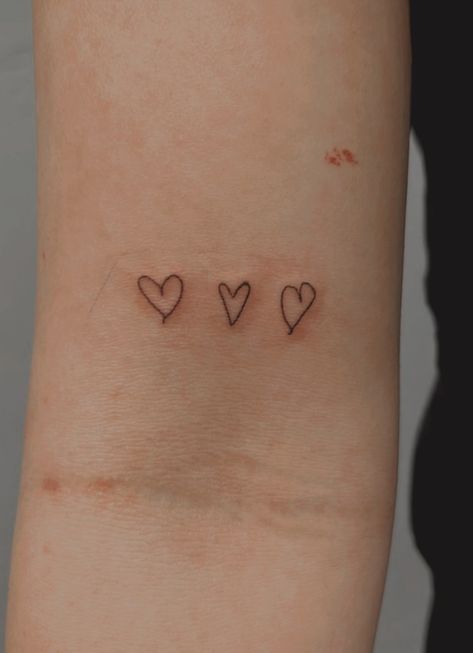 Hearts By Family Tattoo, 3 Hearts In A Row Tattoo, Tattoo For Daughters For Mother, Cute Matching Tattoos 3 People, Heart Sibling Tattoo, Trio Heart Tattoo, Three Tiny Heart Tattoo, Dot Heart Tattoo, Heart Friendship Tattoos