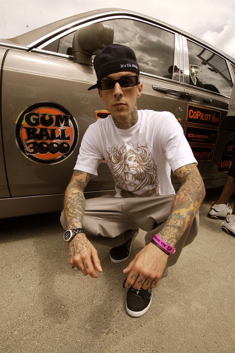 Drummer extraordinaire a Blink-182's Travis Barker takes a moment beside his Rolls Royce Phantom Travis Barker 90s, Gumball 3000, Las Vegas City, Travis Barker, Rolls Royce Phantom, Inked Men, Blink 182, Phuket, Royce