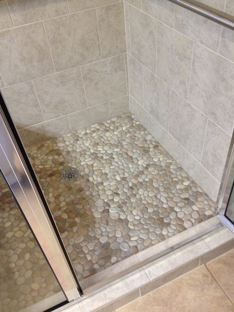 White Pebble Tile, Pebble Tile Shower Floor, Stone Shower Floor, Tile Shower Floor, Pebble Tile Shower, Pebble Shower, Pebble Mosaic Tile, Blue Laundry Rooms, Tub To Shower Conversion