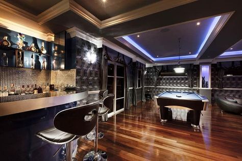 Man cave with cherry hardwood floors home bar pool table tray ceiling lighting Man Cave Designs, Dream Man Cave, Modern Man Cave, Custom Home Bars, Man Cave Design, Modern Home Bar, Ultimate Man Cave, Home Bar Design, Man Cave Basement