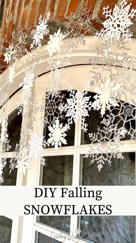 Dollar store snowflakes over door Winter Ceiling Decorations Diy, Snowflake Chandelier Diy, Diy Hanging Snowflakes Ceilings, Decorate With Snowflakes, Snowflake Porch Decorations, Hanging Snowflakes Front Porch, Christmas Snowflake Decor Ideas, Hanger Snowflakes Diy, Diy Christmas Wonderland Decor