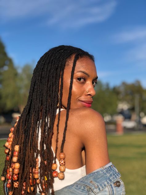 #locs #locstyles #dreadlocks #dreadstyles #naturalhair #naturalhairstyles #locbeads #hairbeads #beads #denim #locstylesforwomen #blackwomenhairstyles #blackwomenshairstylesnatural #dreads Dreadlocks With Beads Black Women, Long Locs With Beads, Beads On Dreads Locs, Temporary Dreadlocks Black Women, Locs With Beads Black Women, Beads In Locs, Locs And Beads, Loc Styles With Beads, Beaded Locs