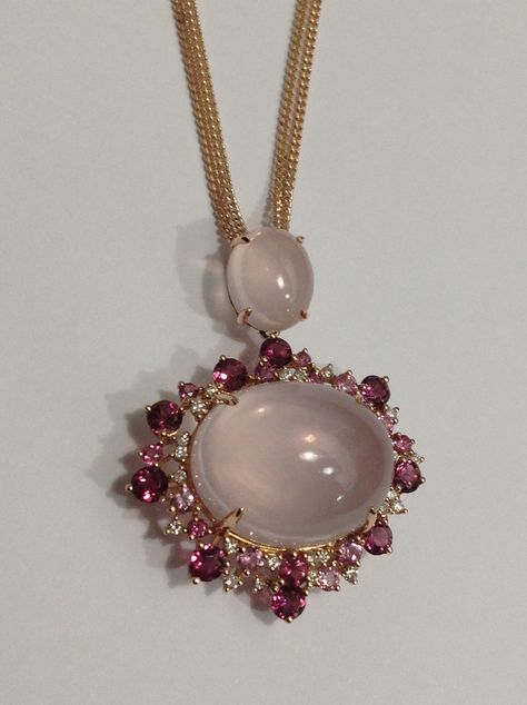 The stunning matching pendant to the ring; a cabochon cut rose quartz surrounded by dazzling white diamonds and pink tourmalines set in rose gold. Random Necklaces, Fancy Sarees With Price, Diamond Locket, Rose Quartz Jewelry, Pretty Jewelry, Stone Pendant Necklace, Fancy Sarees, Pink Quartz, Gems Jewelry