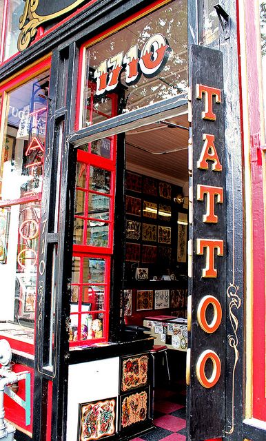 tattoo parlor window pictures | tattoo parlor door Tattoo Shop Front Window, Traditional Tattoo Shop Interior, Tattoo Shop Pictures, Tattoo Shop Aesthetic Grunge, Tattoo Parlour Aesthetic, Vintage Tattoo Shop Aesthetic, Tattoo Shop Exterior, Door Tattoo Ideas, Tattoo Parlor Interior