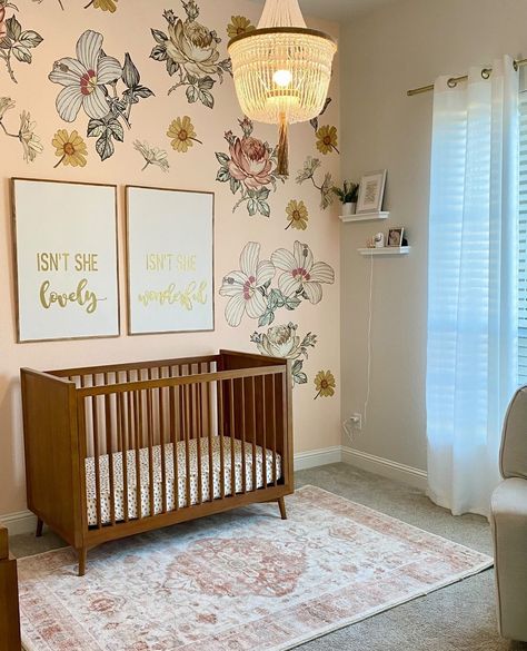 These wall decals look amazing on any color wall! The blush pink walls make them pull more feminine in this nursery, but against a moodier wall they look more boho. ⁠ 📸: @heyelizabeth⁠ Blush Pink Walls, Flower Peel And Stick Wallpaper, Boho Floral Nursery, Feminine Nursery, Nursery Accents, Nursery Accent Wall, Floral Wall Decals, Vintage Flowers Wallpaper, Nursery Room Inspiration