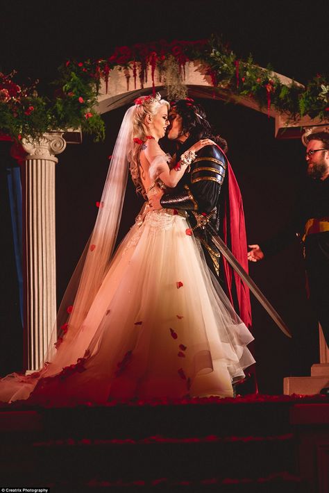 Unique: Vampire-obsessed couple Logan South, 30, and Daley Catherine, 29, tied the knot in an extravagant, $120,000 ceremony paying tribute to their community¿complete with a Dracula cake, pole dancers, and fangs Vampire Wedding, Red Rose Petals, Dark Wedding, Weddings By Color, Cathedral Veil, King And Queen, Gothic Wedding, White Gowns, Halloween Wedding