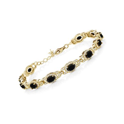 PRICES MAY VARY. Sleek Onyx Sophistication: Elevate your style with our exquisite 18K Yellow Gold Plated Silver 6X4MM Oval Black Onyx Tennis Bracelet. The captivating Oval Black Onyx gemstones, totaling 8.00 Cttw, exude a sleek and sophisticated allure that commands attention. Lustrous Gold Plated Silver: Crafted with precision, this tennis bracelet features a luxurious 18K Yellow Gold Plated Silver setting that beautifully complements the boldness of the Black Onyx gemstones. The combination of Sapphire Tennis Bracelet, Sapphire Bracelet, Fine Jewelry Bracelets, Gem Stone, Sapphire Gemstone, Bracelet For Women, Bracelets And Charms, Gold Plated Silver, Tennis Bracelet