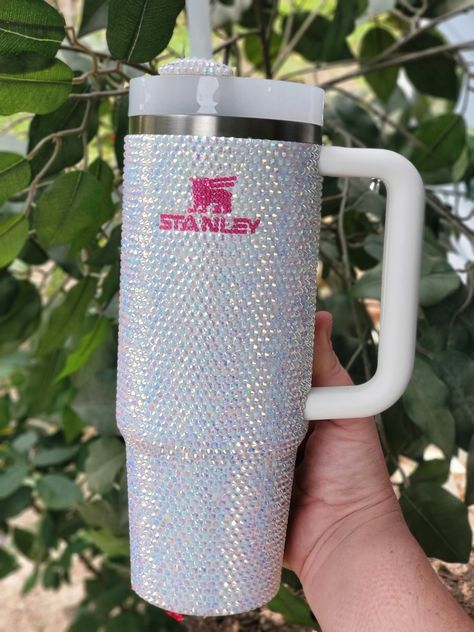 Absolutely stunning White AB Rhinestone Stanley 30oz  cup! Get yours just in time for the holidays!  Each tumbler is hand placed with premium rhinestones and sealed with industrial strength crystal adhesive to insure a long lasting & sterdy life!  💥GUARANTEE💥 because it's life & accidents DO happen, I will include spare rhinestones in each order to ensure your stanley always sparkles!  I also provide a lifetime guarantee of rhinestone replacements! All you need to do is cover the small cost of Stanley 30oz, Stanley Tumbler, Stanley Cup, Just In Time, In Time, Hobbies, Tumbler, Long Lasting, Let Me