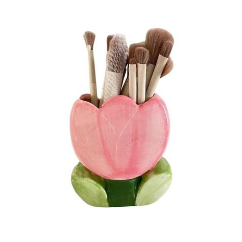 PRICES MAY VARY. Elegant Design: This brush holder is designed with a beautiful tulip shape, adding a touch of elegance to your bathroom or vanity table. Multipurpose Organizer: The ceramic holder is perfect for storing a variety of beauty tools, such as makeup brushes, lipsticks, eyeliners, nail polishes, and more. It helps keep your space organized and clutter-free. Durable and Easy to Clean: Made with high-quality ceramic material, this brush holder is sturdy and durable, ensuring long-lastin Ceramic Tulip, Countertop Vanity, Slab Ceramics, Paint Brush Holders, Makeup Organization Diy, Design Makeup, Ceramic Tools, Makeup Holder, Air Dry Clay Projects