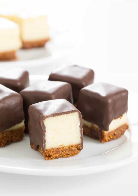 Cheesecake bites are nothing more than little chocolate-covered bites of creamy cheesecake. No special equipment and no water bath needed, since chocolate covers all. SO good! Tiny Bites, Mini Cheesecake Bites, Thanksgiving Dinner Ideas, Dessert Inspiration, Gluten Free Cheesecake, How To Make Cheesecake, Cake Bites, Cheesecake Bites, Desserts Recipes