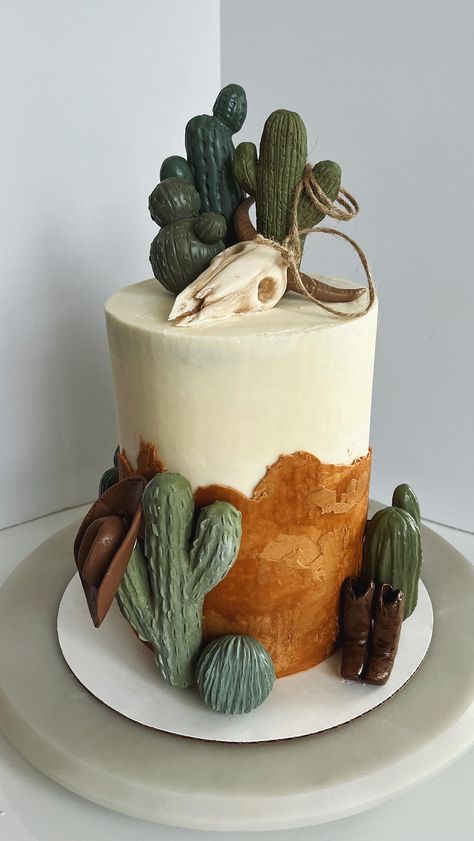 All the angles of this beautiful desert cowboy cake! Vanilla sponge with mixed berry filling and vanilla buttercream! • Los Angeles custom… | Instagram Country Theme Cake Pops, Different Shape Cake Ideas, Elegant Whipped Cream Cake Design, Cowboy Bday Cake, Western Graduation Cake Ideas, Wild West Dessert Ideas, Western Cupcakes Cowboy, Desert Themed Cake, Cowboy Birthday Cake For Men