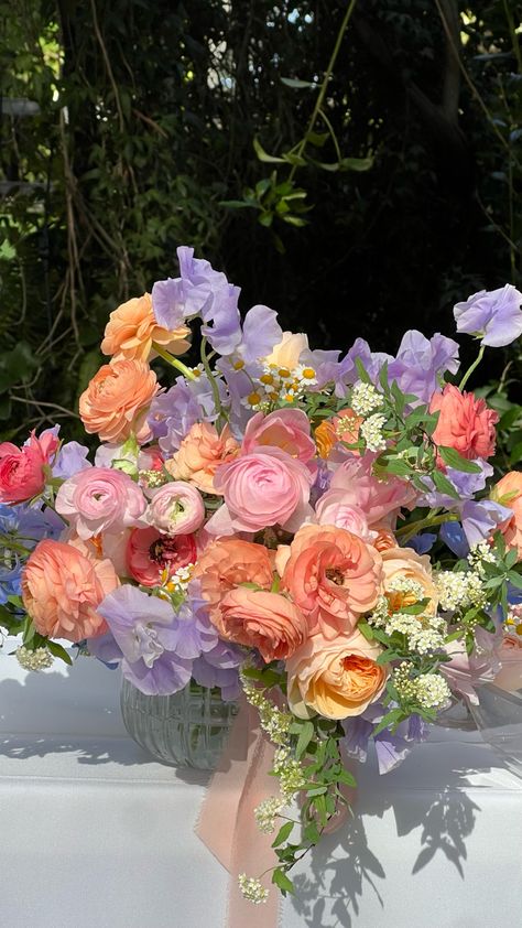 Peach ranunculus bouquet May Flowers Bouquet, Pastel Colors Bouquet, Garden Wedding Floral Arrangements, Lavender And Peach Aesthetic, Pink And Peach Flowers, Purple And Peach Bouquet, Flower Garden Wedding Ideas, Lavender And Peach Wedding Decor, Lavender Garden Wedding