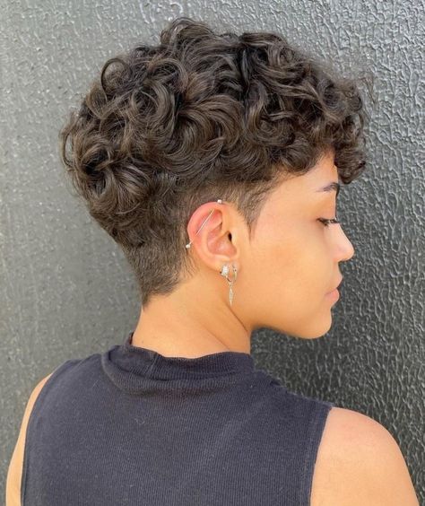 Put-Together Short Curly Undercut Hairstyle Shaved Curly Pixie, Low Fade Curly Hair Women, Short Curly Fade Women, Short Curly Hairstyles Shaved Sides, Short Curly Hair Undercut Woman, Curly Hair With Shaved Side, Short Curly Hair Fade, Short Pixie Haircuts For Curly Hair, Short Hair Perm Pixie Cuts