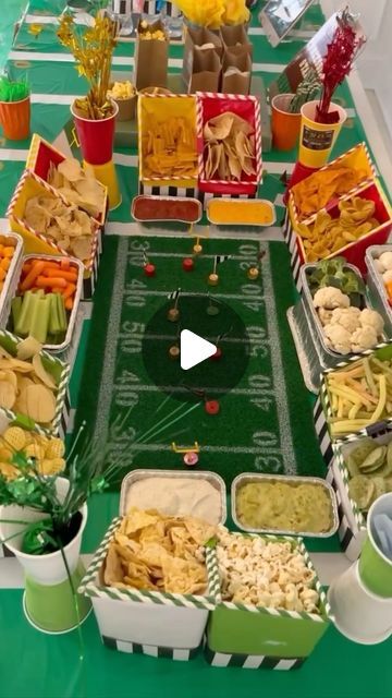 Shannon Doherty on Instagram: "EASY SUPER BOWL SNACK STADIUM 🏈 who do you think will be in the big game?? This is the ONLY way to host your football party this year! Full material list- - 4 Soda Boxes - Wrapping Paper in your teams colors - Decorative straws, paper bags and team stickers - aluminium foil tray - team color cups - turf field for center - snacks - streamers COMMENT - LINKS - I will send you links to everything you need to make this snack stadium party this year and full directions! FOLLOW ME @athomewith.shannon for more super simple ideas that everyone will love and everyone can do! I am determined to make every gathering at your house a moment that you will always remember! #superbowlparty #superbowl #footballparty #snackstadium #footballdiy #superbowlstadium" Football Snack Stadium, Super Bowl Snack Stadium, Super Bowl Stadium, Shannon Doherty, Snack Stadium, Super Bowl Snack, Superbowl Party Games, Easy Super Bowl, Football Party Foods